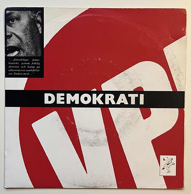ANIS & OAKLAND - DEMOKRATI Swedish experimental synth single from 1985. Members of Lustans Lakejer and Ratata. Red sleeve. (7")